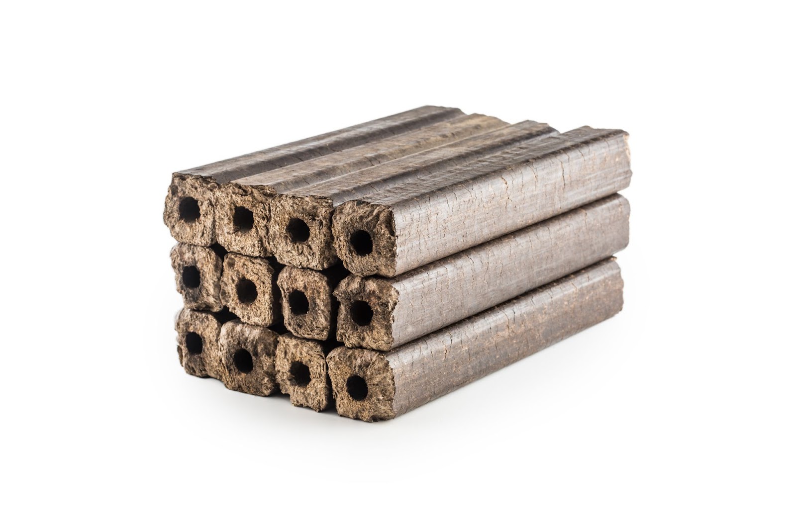wooden-pressed-briquettes-pini-kay-from-biomass-white-isolated-background (2).jpg - 