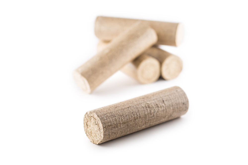 wooden-pressed-briquettes-from-biomass-white-isolated-background (3).jpg - 