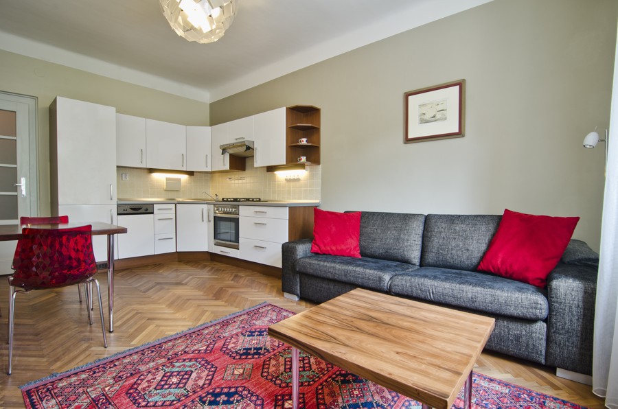 Obývací pokoj s kuchyňským koutem - Ateliér bytový architekt