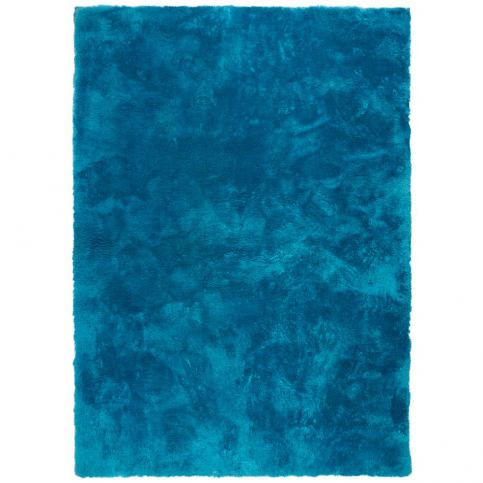 Modrý koberec Universal Nepal Liso Azul, 140 x 200 cm - Bonami.cz