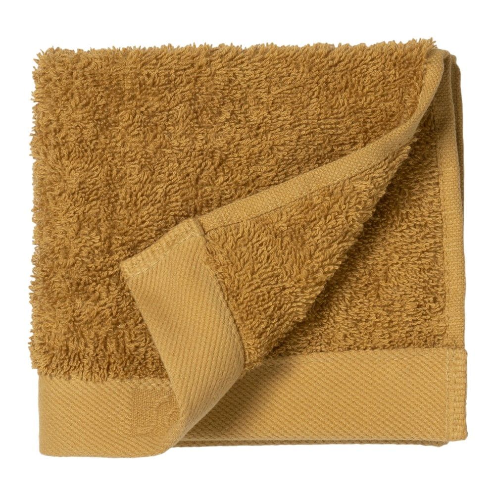 Žlutý ručník z froté bavlny Södahl Golden, 30 x 30 cm - Bonami.cz