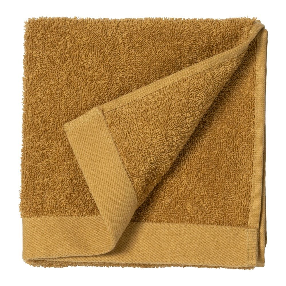 Žlutý ručník z froté bavlny Södahl Golden, 60 x 40 cm - Bonami.cz
