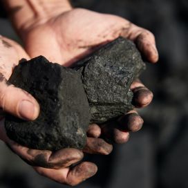 poor-middleaged-man-holding-hands-stone-coal-sale-provide-food-his-family (2).jpg