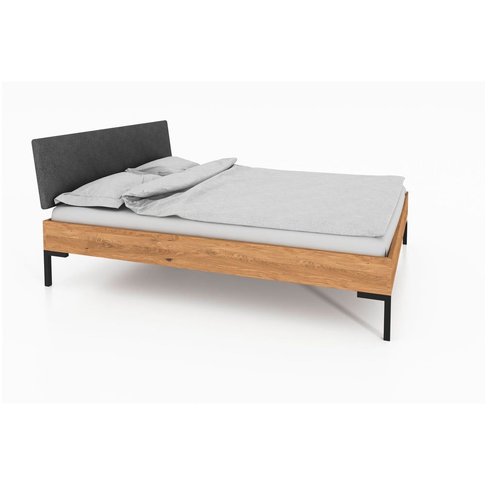Dvoulůžková postel z dubového dřeva s čalouněným čelem 180x200 cm Abies 1 – The Beds - Bonami.cz